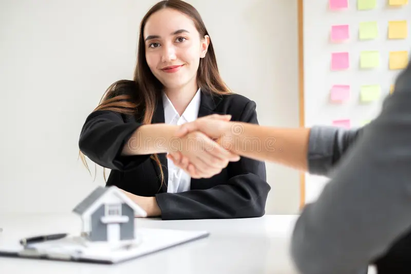 businesswoman brokers real estate agents shake hands completing negotiations to buy house insurance sign contracts home 328984655