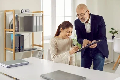 happy client signing contract agreement 260nw 2145828593